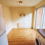 Kitchen and dining area with wooden floors