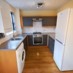 Kitchen with white goods in Milton Keynes rental property