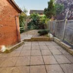 Rear garden with tiles in Milton Keynes rental property