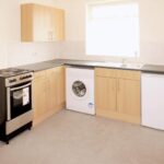 Small kitchen with white goods in house to rent Milton Keynes