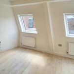 Unfurnished room with cream coloured wooden floors in rental property near Milton Keynes