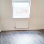 Room with sloping walls in flat to rent near Milton Keynes