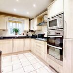 Furnished kitchen with white goods in flat to rent Milton Keynes