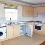 Kitchen with white goods in house for rent in Milton Keynes