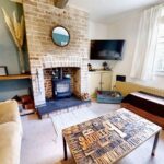 Living room with feature fireplace in Milton Keynes rental property