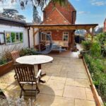 Back garden with garden furniture in house to rent Milton Keynes