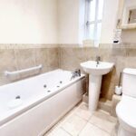 Family bathroom with bathtub in apartment for rent Milton Keynes