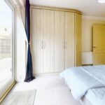 Furnished double bedroom with large wardrobe in two bedroom apartment to rent in Milton Keynes